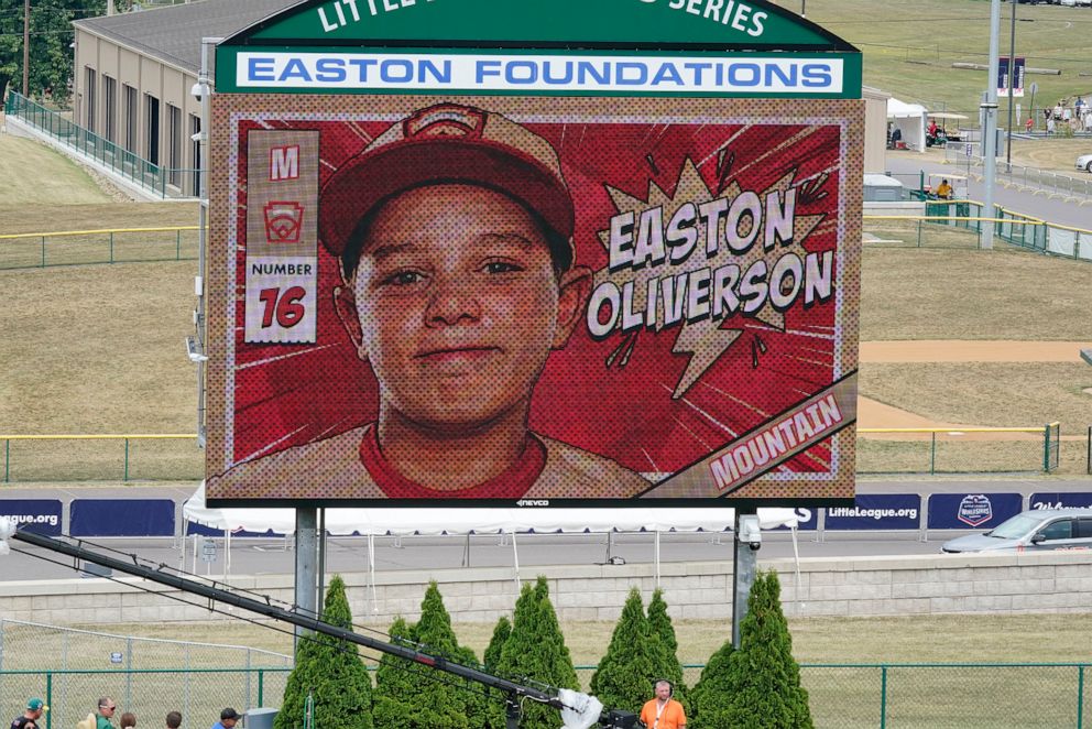 An image of Mountain Region Champion Little League team member Easton Oliverson is displayed on the scoreboard at Volunteer Stadium during the opening ceremony of the 2022 Little League World Series An image of Mountain Region Champion Little League team member Easton Oliverson is displayed on the scoreboard at Volunteer Stadium during the opening ceremony of the 2022 Little League World Series