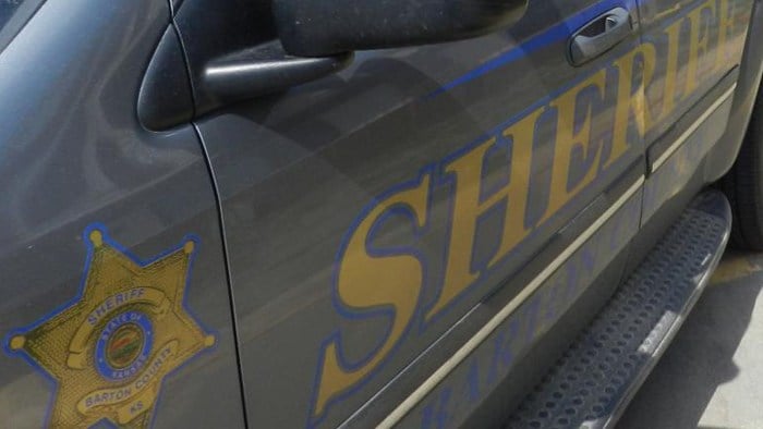 Kansas woman dies, man hurt after SUV collides with combine