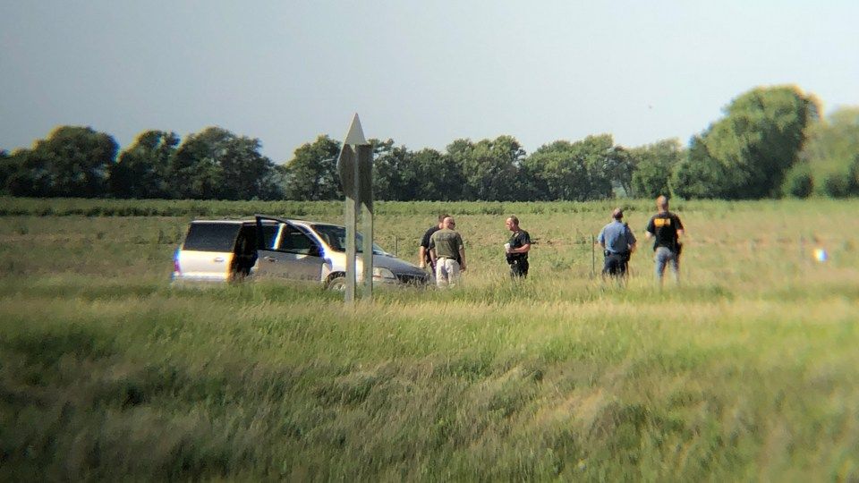Scene in Ottawa County where a man was captured after shooting 2 deputies in Jewell County, fleeing and then shooting himself. (KAKE)