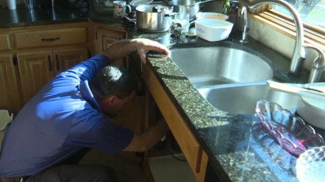 Plumbers Busy Unclogging Sinks On Brown Friday