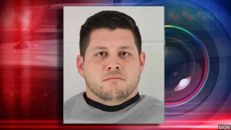 Overland Park man charged with posting nude photos of 