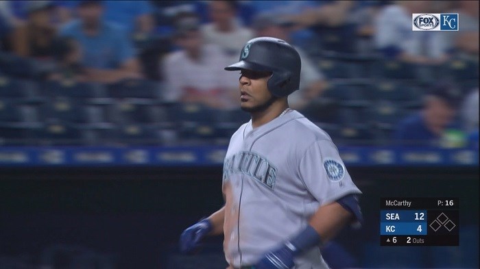 Encarnacion HRs twice in 6th, Mariners roll over Royals 13-5