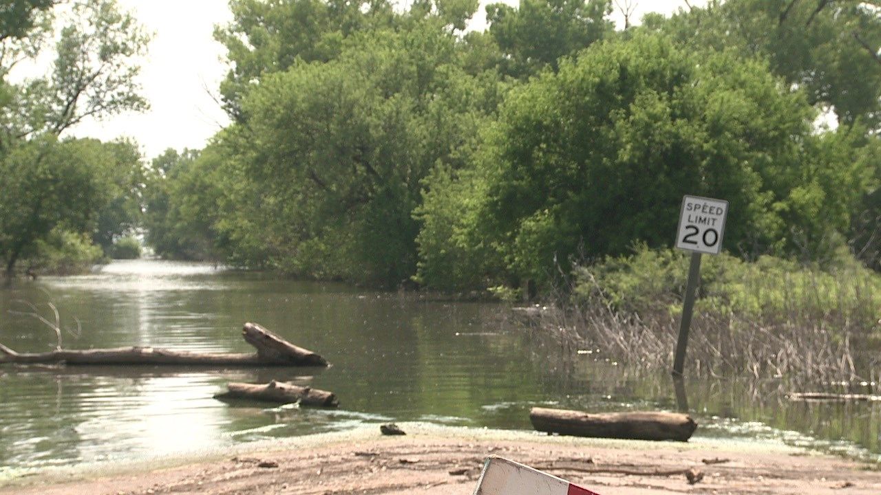 Guests at Cheney Lake face high floodwaters on the first day of