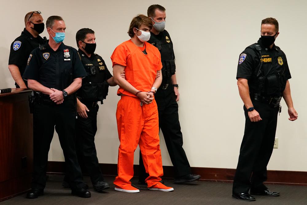 Payton Gendron is led into the courtroom for a hearing at Erie County Court, in Buffalo, N.Y., Thursday, May 19, 2022.(AP Photo/Matt Rourke, File)