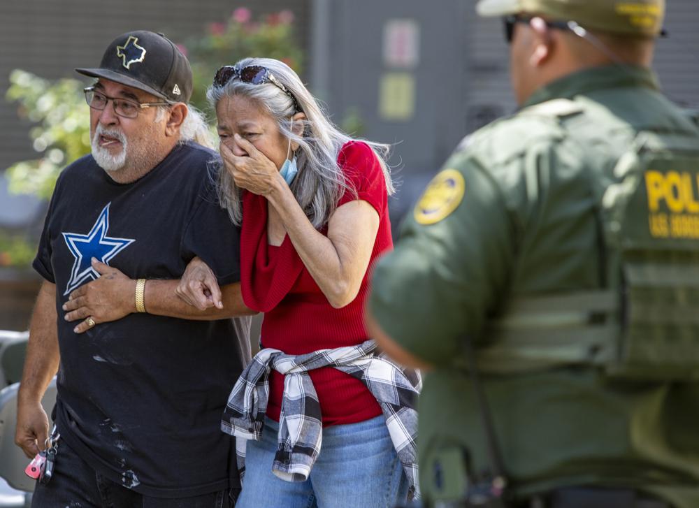 A woman cries as she leaves the Uvalde Civic Center, Tuesday May 24, 2022, in Uvalde, Texas(William Luther/The San Antonio Express-News via AP, File)