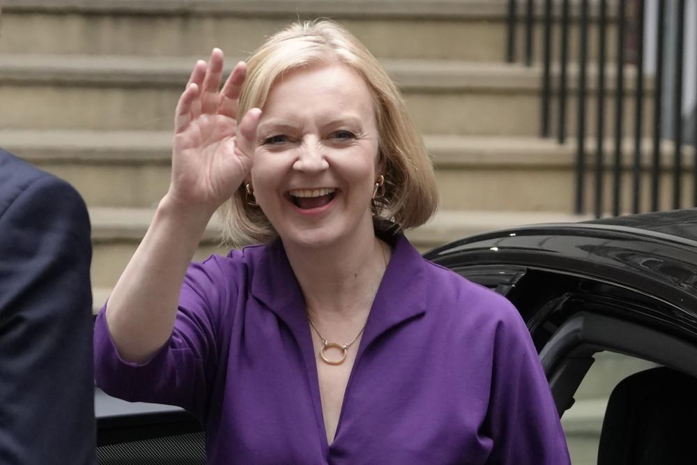 Liz Truss arrives at Conservative Central Office in Westminster after winning the Conservative Party leadership contest in London (AP Photo/Kirsty Wigglesworth, File)