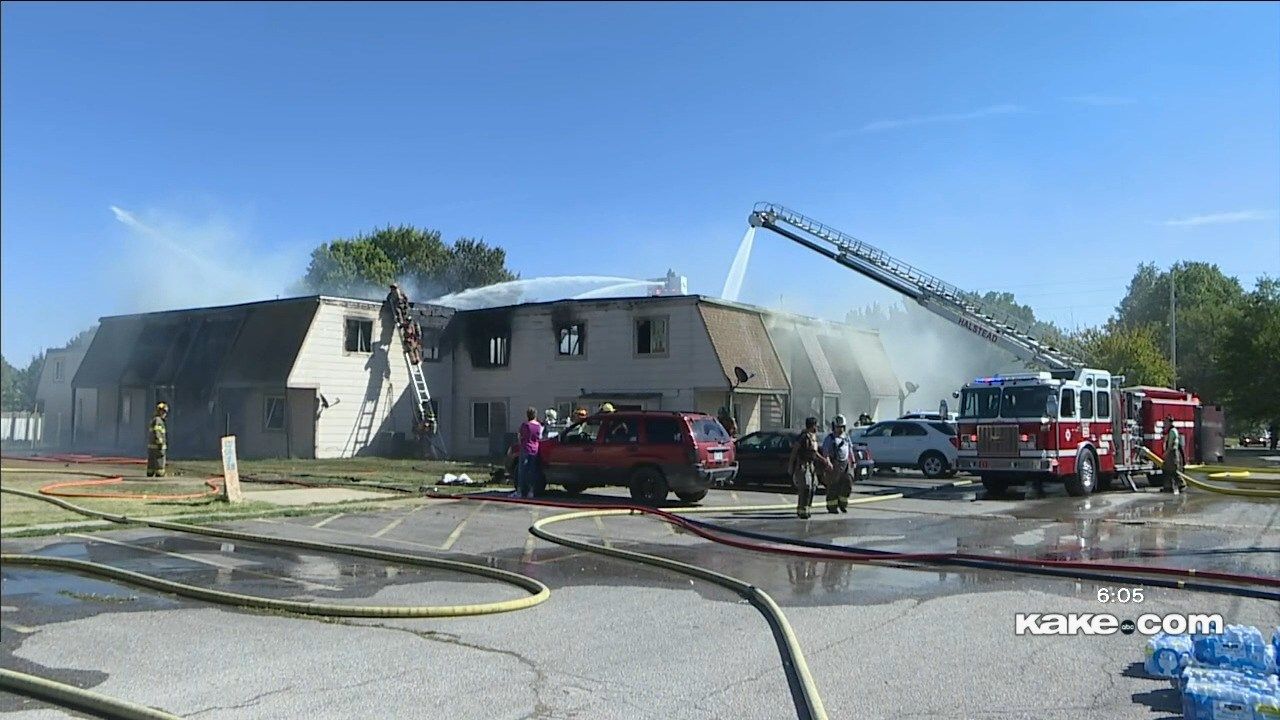 Residents pickup pieces after Newton apartment fire KAKE