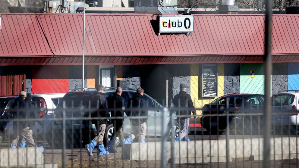 Law enforcement officials continue their investigation into Saturday's shooting at the Club Q nightclub, Nov. 21, 2022 in Colorado Springs, Colorado.