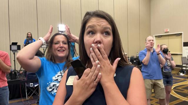 Kansas state Rep. Stephanie Clayton, an abortion rights supporter who was a Republican and is now a Democrat, reacts as a referendum to strip abortion rights out of the state constitution fails.
