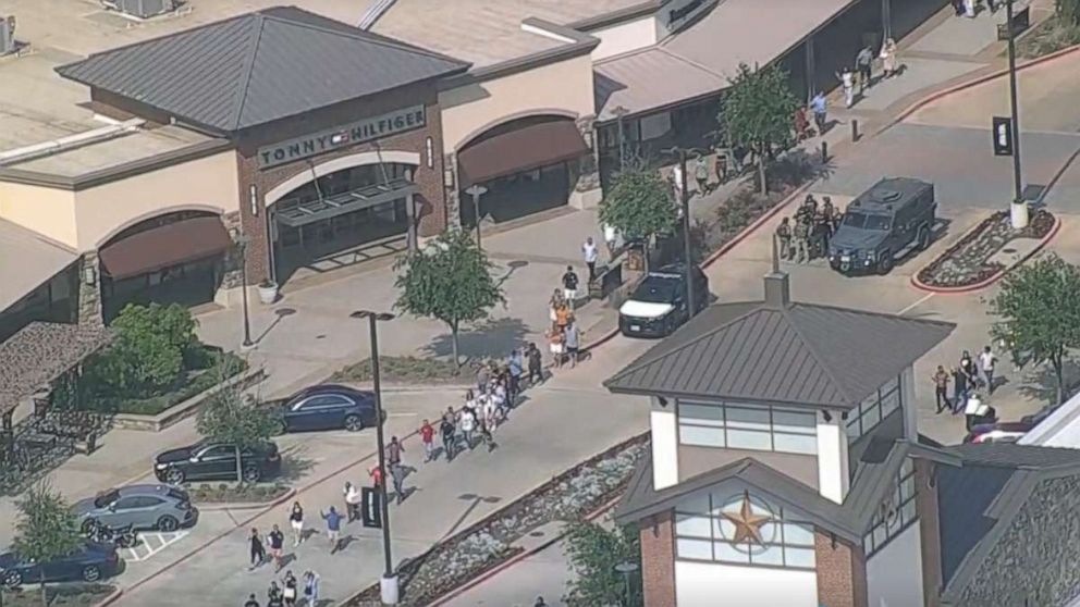 Shoppers are evacuated from the Allen Premium Outlets in Allen, Texas, May 6, 2023.