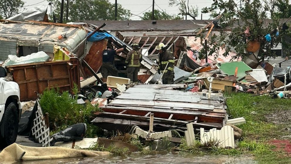 First responders look through rubble after a tornado touched down in Laguna Heights, Texas, on May 13, 2023.