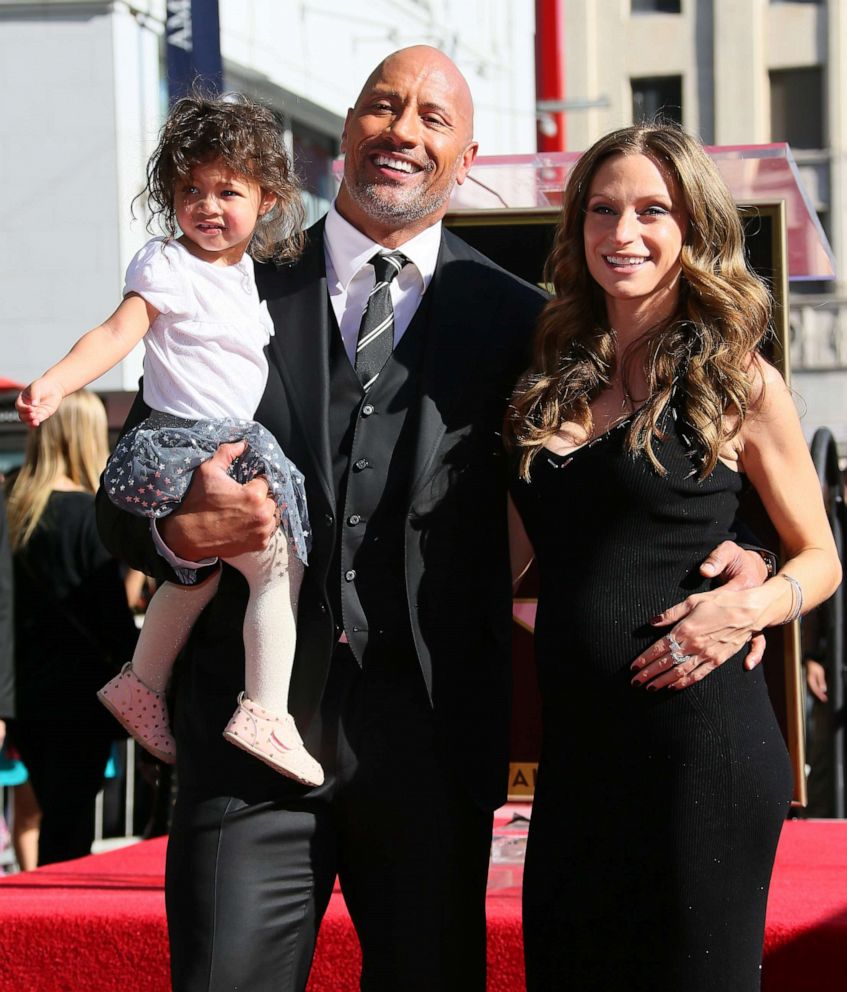 Dwayne Johnson, Lauren Hashian and daughter Jasmine Johnson attend a ceremony honoring him with a star on The Hollywood Walk of Fame on Dec. 13, 2017 in Los Angeles.