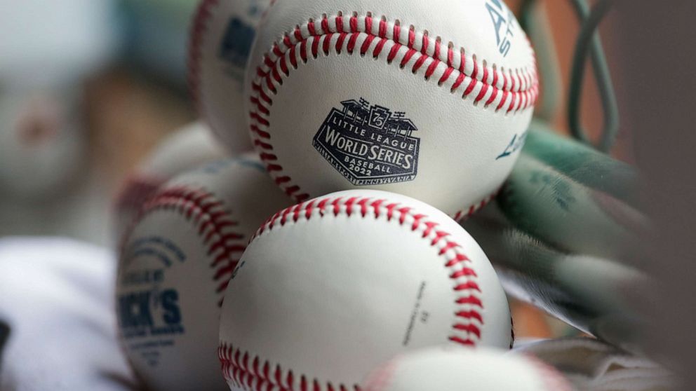 Little League World Series balls are stacked before the Little League World Series consolation game