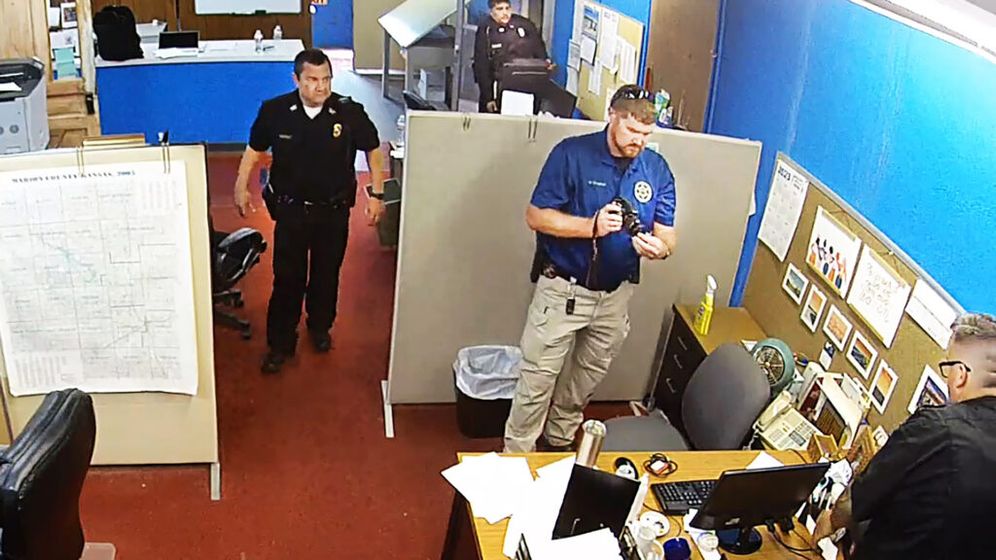 A new lawsuit says Marion Police Chief Gideon Cody, top left, spearheaded the Aug. 11 raid of the Marion County Record in retaliation against the journalists who worked there.