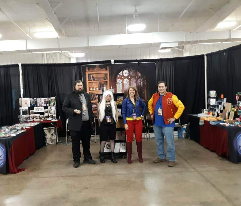 Redington and friends striking a pose at Smallville Con