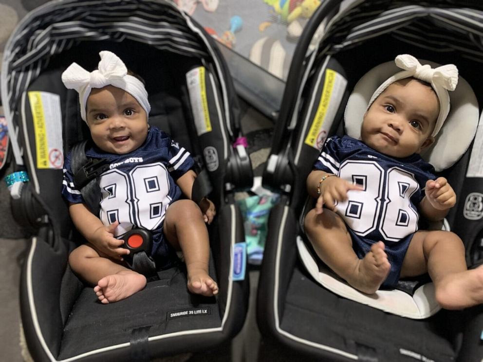 Twin sisters AmieLynn and JamieLynn Finley are pictured in Dallas Cowboys' jerseys.