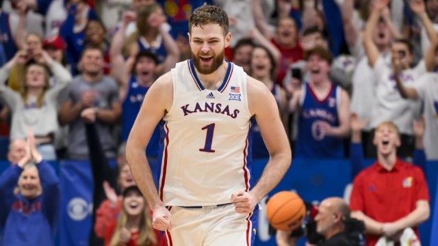 Kansas center Hunter Dickinson celebrates after his basket that gave his team a win over TCU during the second half of an NCAA college basketball game in Lawrence, Kan., Saturday, Jan. 6, 2024.